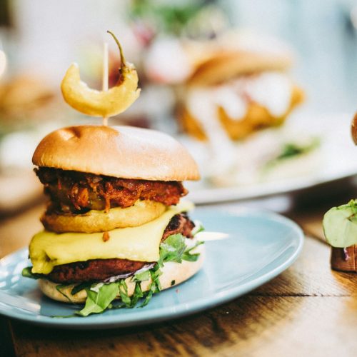 Closeup shot of vegan burgers on a table in a restaurant